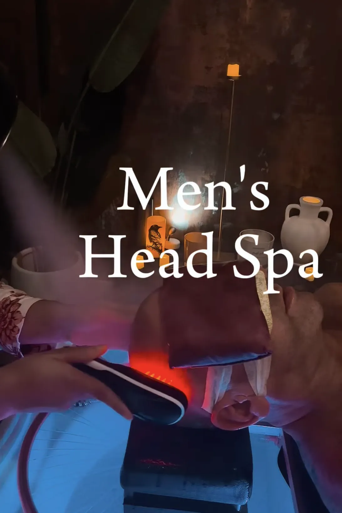 Client enjoying a head spa, massage, and haircut in a holistic wellness setting