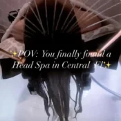 A woman relaxing in a head spa chair with her hair washed.