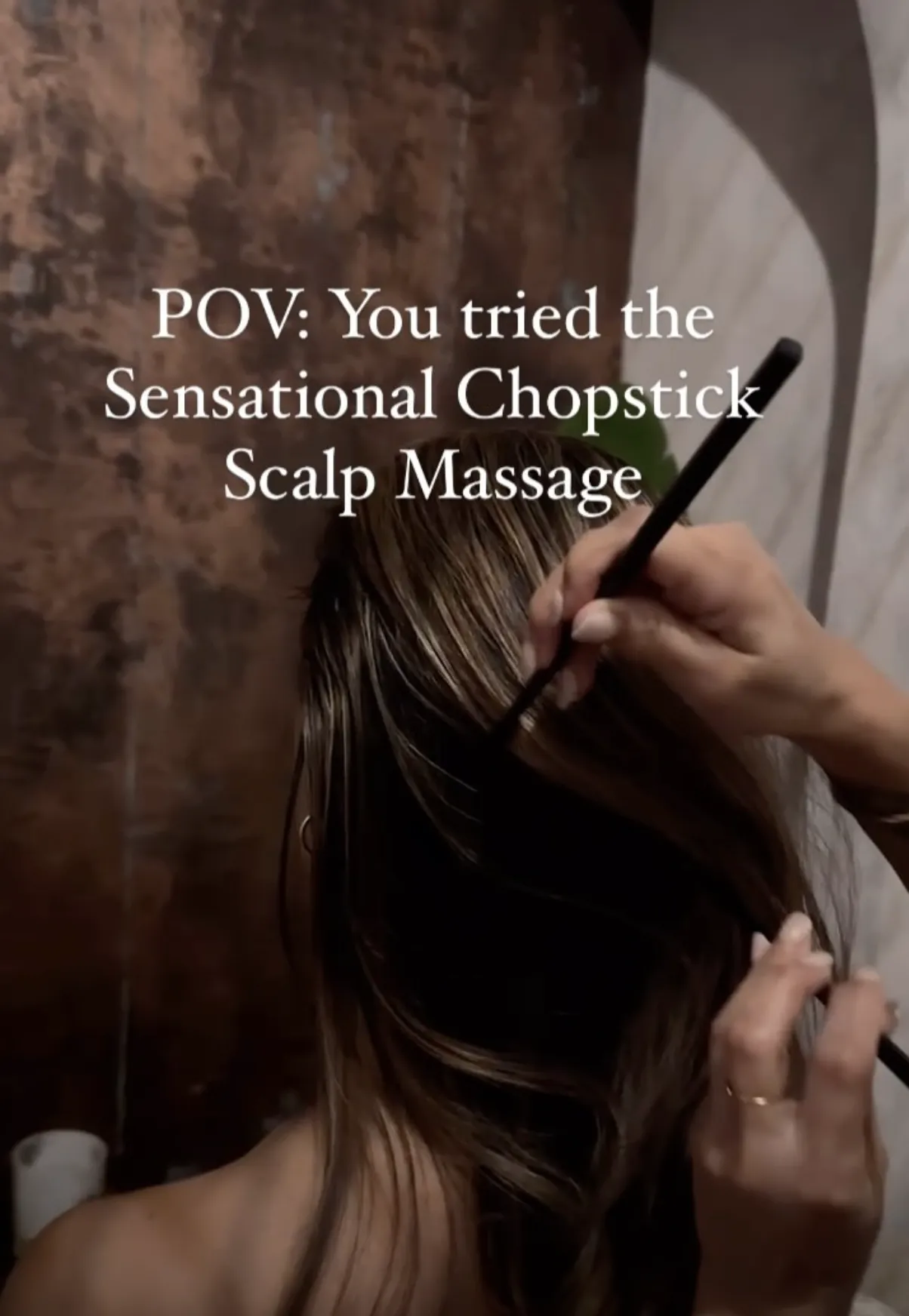 Nourishing scalp treatment with essential oils during a head spa session