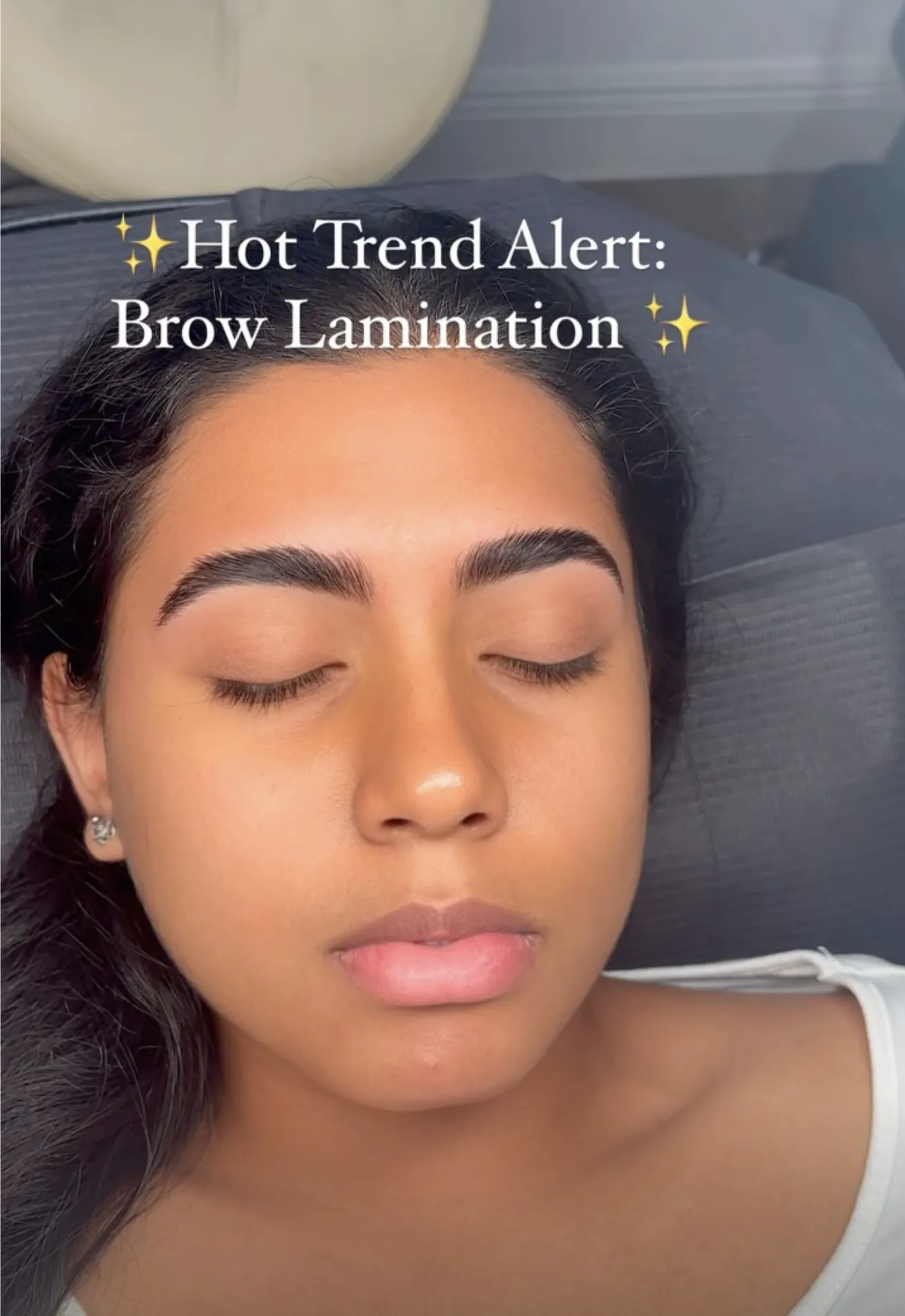 Misting saline solution on microbladed eyebrows to enhance healing and moisture